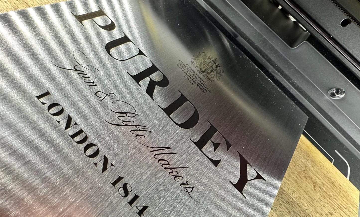 Custom Engraved Metal Plaque – Premium Laser Engraving for Business Logos, Signs & Displays – Brushed Steel Finish – Made in UK